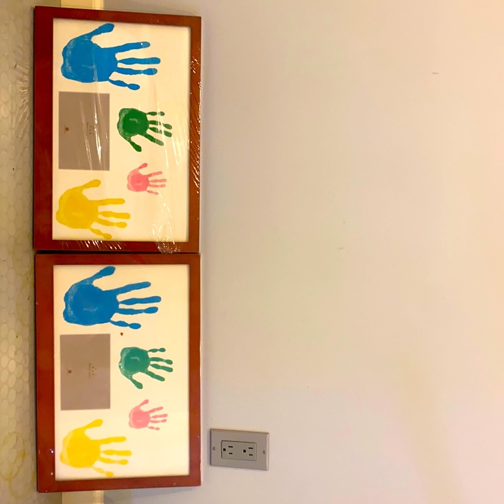 2 clay molds for babies hands